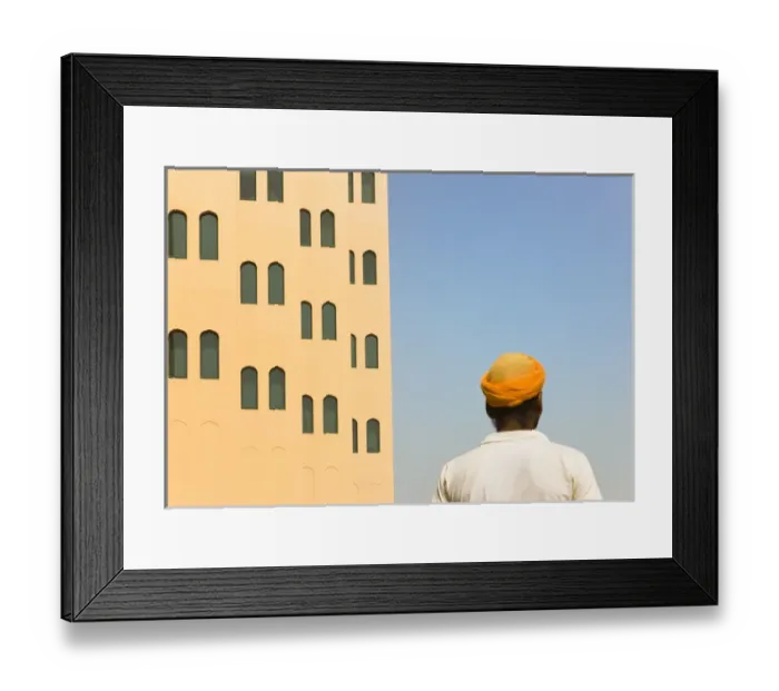 Framed Print : Arabic man with traditional house, old town, Dubai, UAE