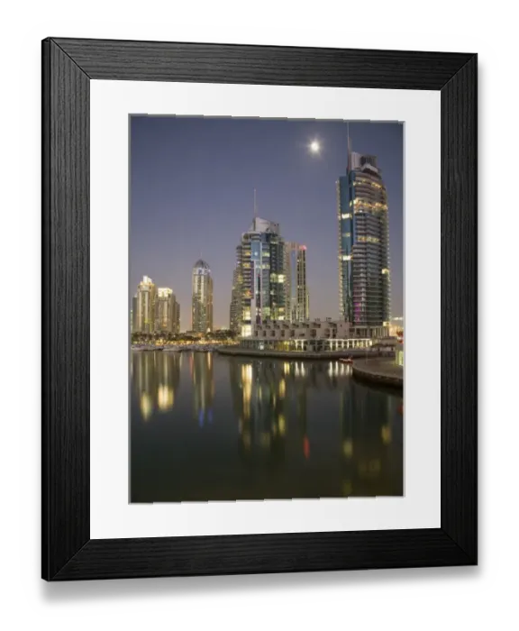 Framed Print : United Arab Emirates, Dubai, Marina. Towers reflect on marina at night with full moon Framed Print : United Arab Emirates, Dubai, Marina. Towers reflect on marina at night with full moon