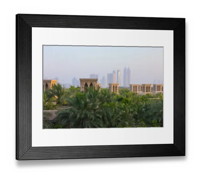 Framed Print : Traditional Wind Houses with modern highrises in the distance, Dubai, United Arab Framed Print : Traditional Wind Houses with modern highrises in the distance, Dubai, United Arab