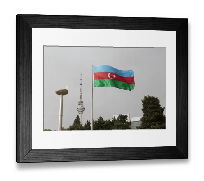 Framed Print : Azerbaijan, Baku. An Azerbaijan flag waves near a memorial flame and the Baku TV tower Framed Print : Azerbaijan, Baku. An Azerbaijan flag waves near a memorial flame and the Baku TV tower