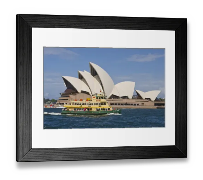 Framed Print : Beautiful closeup of famous Sydney Opera House in Sydney Harbour with ferry passing Framed Print : Beautiful closeup of famous Sydney Opera House in Sydney Harbour with ferry passing