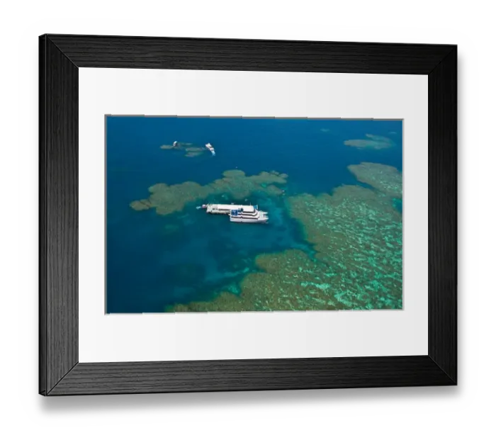 Framed Print : Aerial view of a tour boat docked at a pontoon at the Great Barrier Reef, Queensland Framed Print : Aerial view of a tour boat docked at a pontoon at the Great Barrier Reef, Queensland