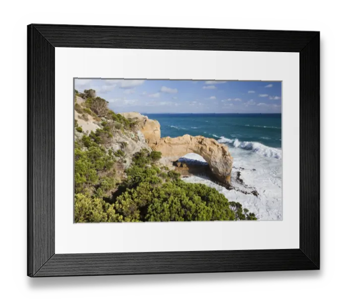 Framed Print : The Arch, Great Ocean Road, Australia, in stormy weather, breakers are coming in Framed Print : The Arch, Great Ocean Road, Australia, in stormy weather, breakers are coming in