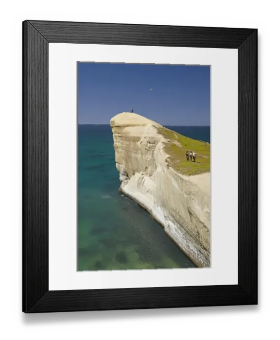 Framed Print : Tourists on cliff top at Tunnel Beach, Dunedin, South Island, New Zealand Framed Print : Tourists on cliff top at Tunnel Beach, Dunedin, South Island, New Zealand