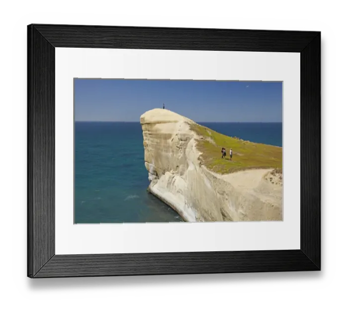 Framed Print : Tourists on cliff top at Tunnel Beach, Dunedin, South Island, New Zealand Framed Print : Tourists on cliff top at Tunnel Beach, Dunedin, South Island, New Zealand