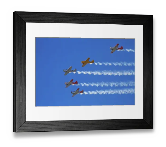 Framed Print : Aerobatic display by North American Harvards, or T-6 Texans, or SNJs