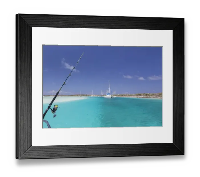 Framed Print : Bahamas, Exuma Island, Cays Land and Sea Park. Moored sailboats and fishing rod. Credit as