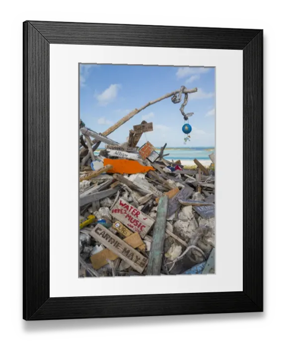 Framed Print : Bahamas, Exuma Island, Cays Land and Sea Park. Driftwood on top of Boo Boo Hill. Credit as
