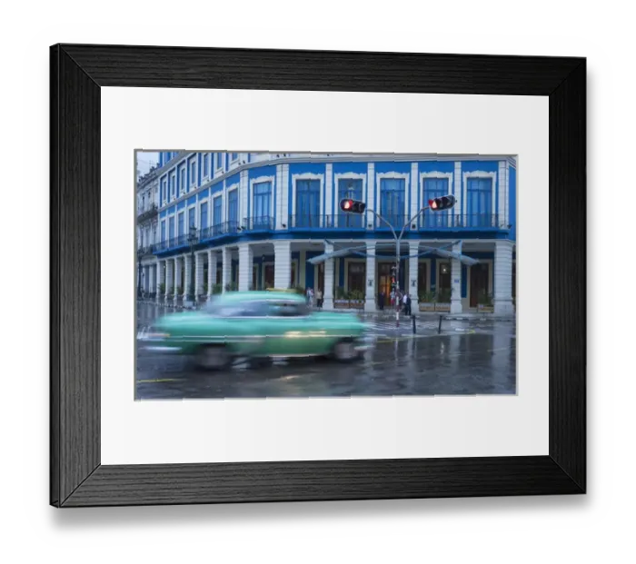 Framed Print : Cuba, Havana. A classic car passes by in a rainstorm the city Framed Print : Cuba, Havana. A classic car passes by in a rainstorm the city