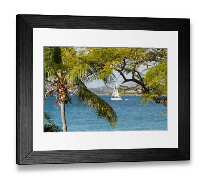 Framed Print : USA, USVI, St John. Sailboat travels between St John and Stevens Cay with St Thomas