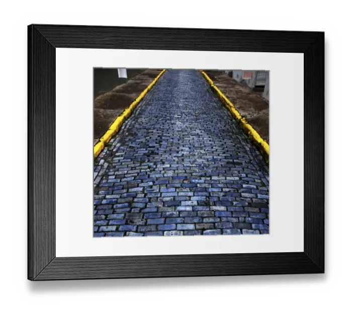 Framed Print : Cobblestones from ships ballast and / or Cannon Balls give the streets of Old Framed Print : Cobblestones from ships ballast and / or Cannon Balls give the streets of Old