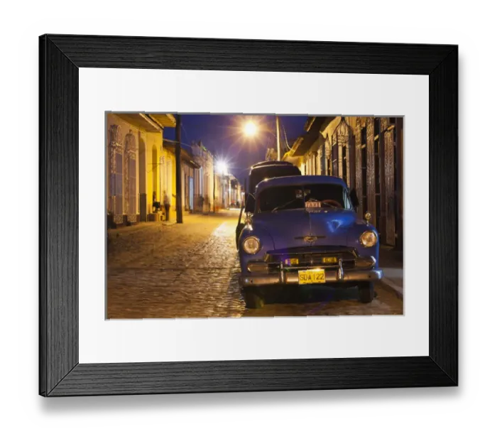 Framed Print : Cuba, Sancti Spiritus Province, Trinidad, taxis on Calle Antonio Maceo, dusk