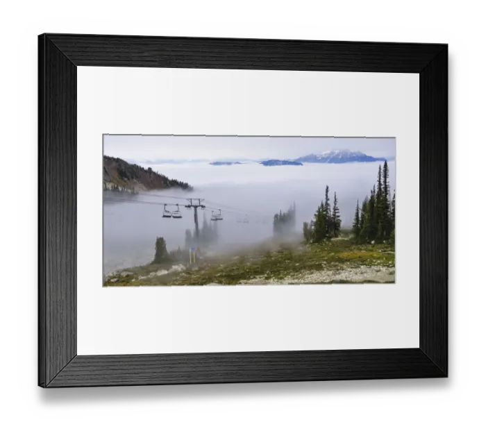 Framed Print : British Columbia, Whistler. Chairlift coming out above the clouds on Whistler Mountain Framed Print : British Columbia, Whistler. Chairlift coming out above the clouds on Whistler Mountain
