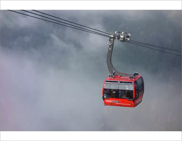 British Columbia, Whistler. Peak to Peak Gondola coming out of the clouds