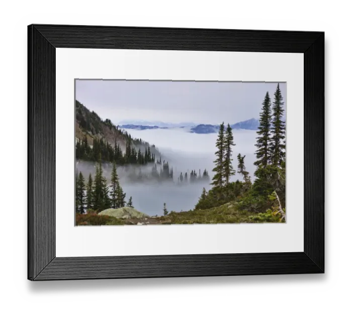 Framed Print : British Columbia, Whistler. Coming out of the clouds on Whistler Mountain
