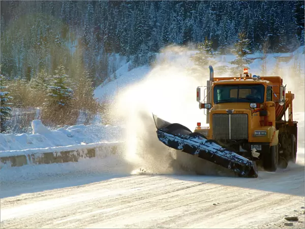 Highway snow plow in winter. Wells B. C. Winter in British Columbia brings a variety of landscapes