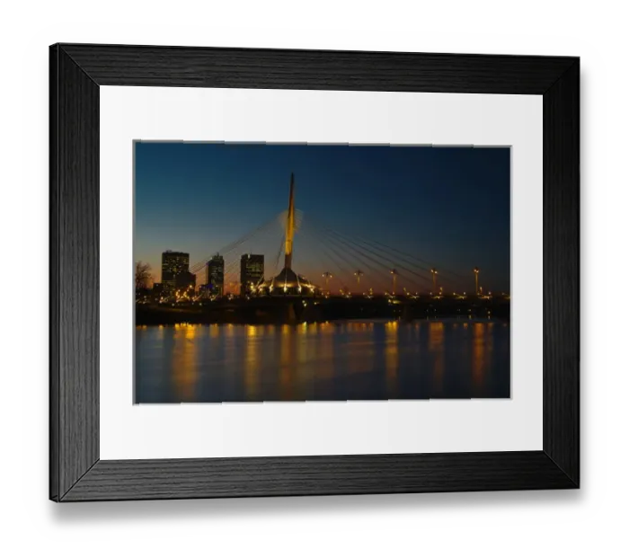 Framed Print : Canada, Manitoba, Winnipeg. Esplanade Riel bridge and city skyline reflected in Red River at dusk Framed Print : Canada, Manitoba, Winnipeg. Esplanade Riel bridge and city skyline reflected in Red River at dusk