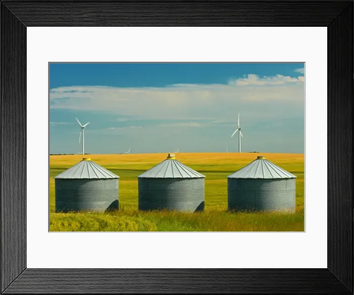 Framed Print : Canada, Manitoba, Somerset. Wind turbines and grain bins