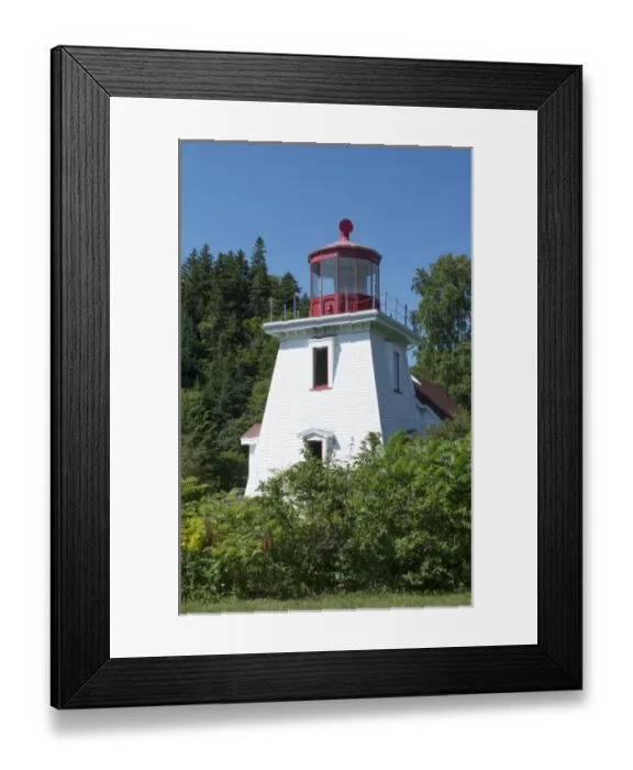 Framed Print : Canada St Martins New Brunswick white tourist lighthouse in small fishing and lobster