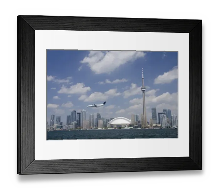 Framed Print : Canada, Ontario, Toronto. Lake Ontario city skyline view of the iconic CN Tower & the Rogers Centre Framed Print : Canada, Ontario, Toronto. Lake Ontario city skyline view of the iconic CN Tower & the Rogers Centre