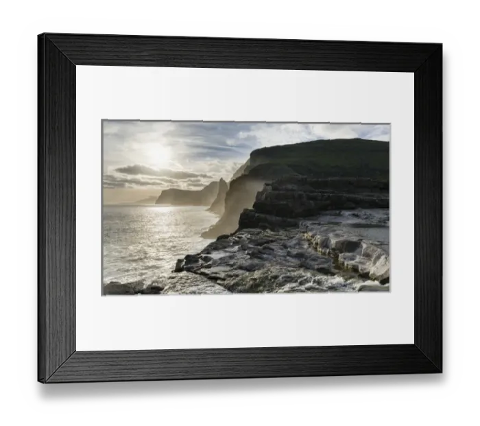 Framed Print : The west coast near Traelanipa with waterfall Bosdalafossur at sunset. The island Vagar