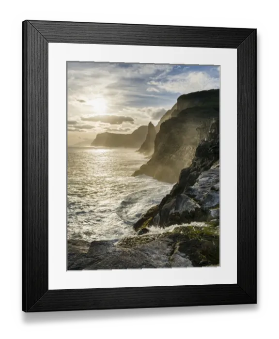 Framed Print : The west coast near Traelanipa with waterfall Bosdalafossur at sunset. The island Vagar