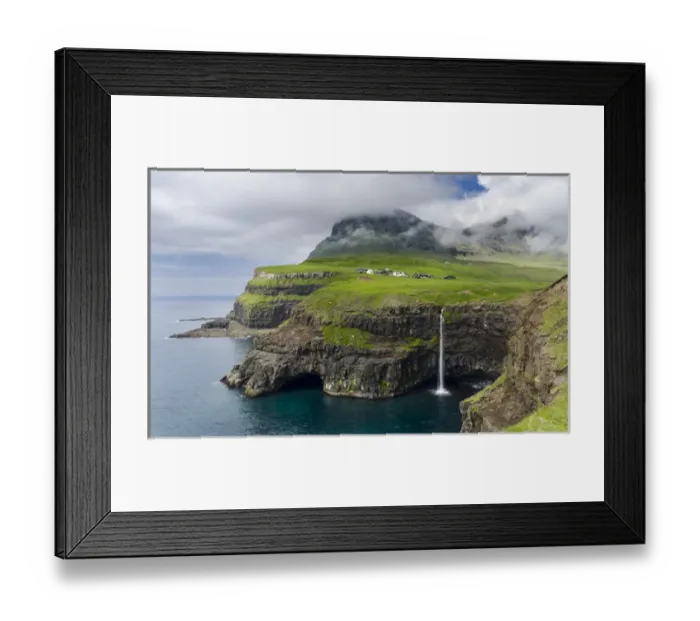 Framed Print : The waterfall near Gasadalur, one of the landmarks of Faroe Islands. The island Vagar Framed Print : The waterfall near Gasadalur, one of the landmarks of Faroe Islands. The island Vagar