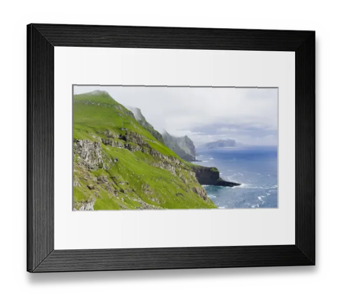 Framed Print : The island Mykines, in the background the island Vagar, part of the Faroe Islands