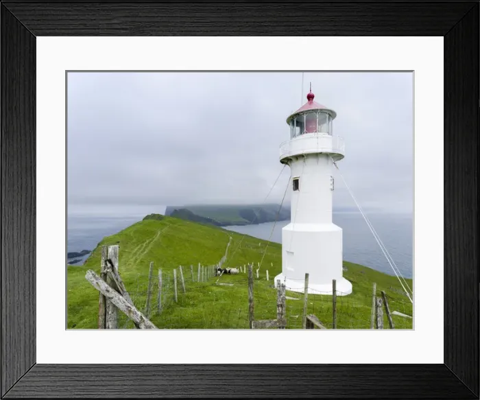 Framed Print : The lighthouse on Mykinesholmur. The island Mykines, part of the Faroe Islands in