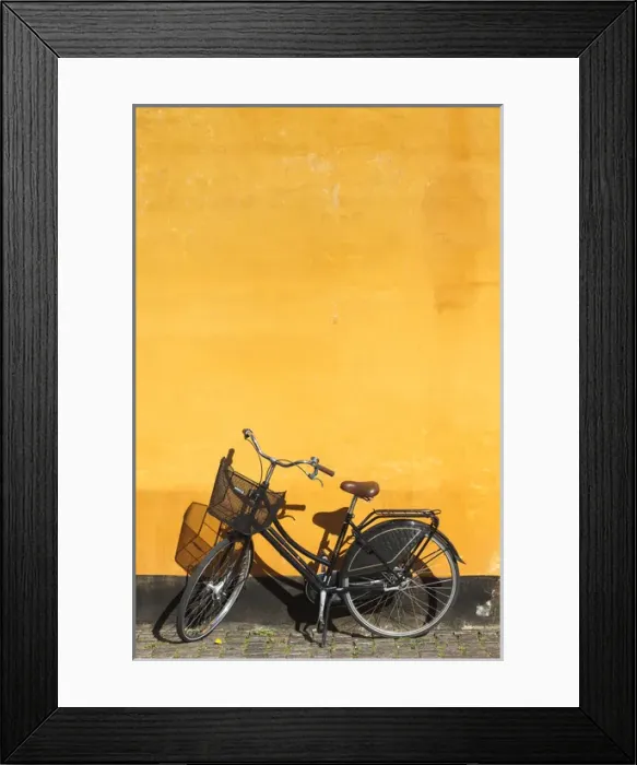 Framed Print : Denmark, Zealand, Copenhagen, yellow building detail with bicycle Framed Print : Denmark, Zealand, Copenhagen, yellow building detail with bicycle