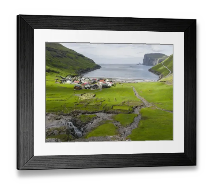 Framed Print : Village Tjornuvik. In the background the island Eysturoy with the iconic sea stacks Risin Framed Print : Village Tjornuvik. In the background the island Eysturoy with the iconic sea stacks Risin