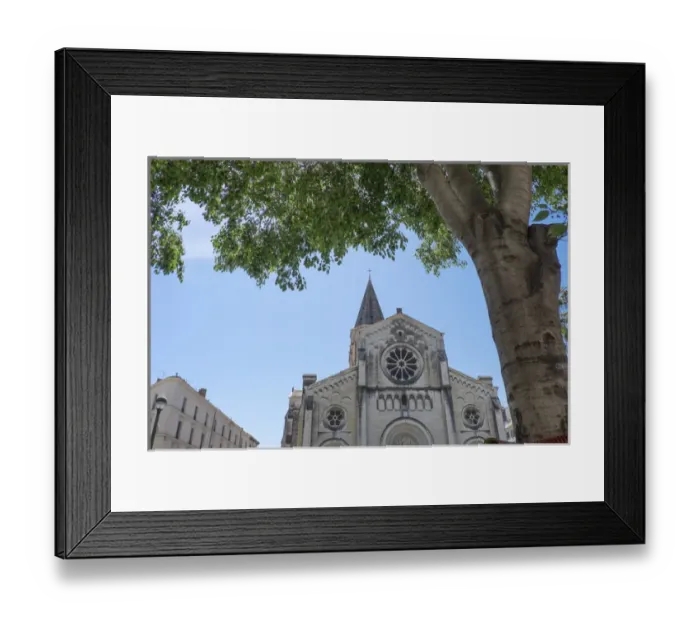 Framed Print : France, Nimes, Saint Paul church. Gothic church with one spire and rose window
