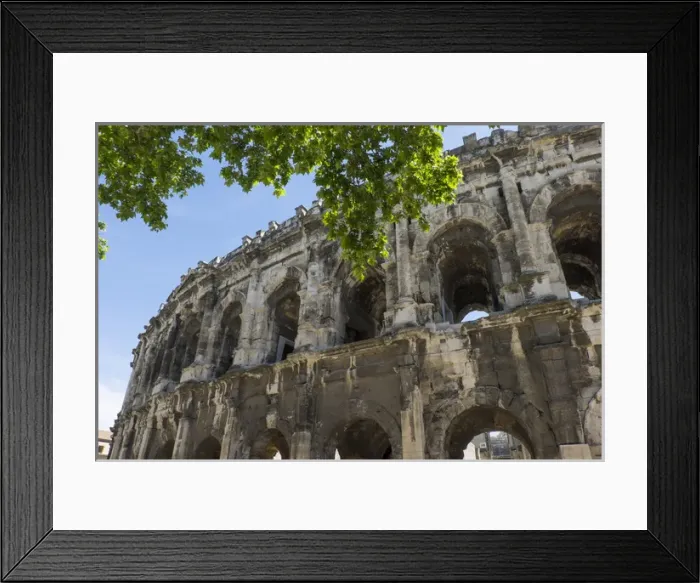 Framed Print : France, Nimes, Roman Amphitheater or arena built 70 AD. It was historically used for bull fighting Framed Print : France, Nimes, Roman Amphitheater or arena built 70 AD. It was historically used for bull fighting