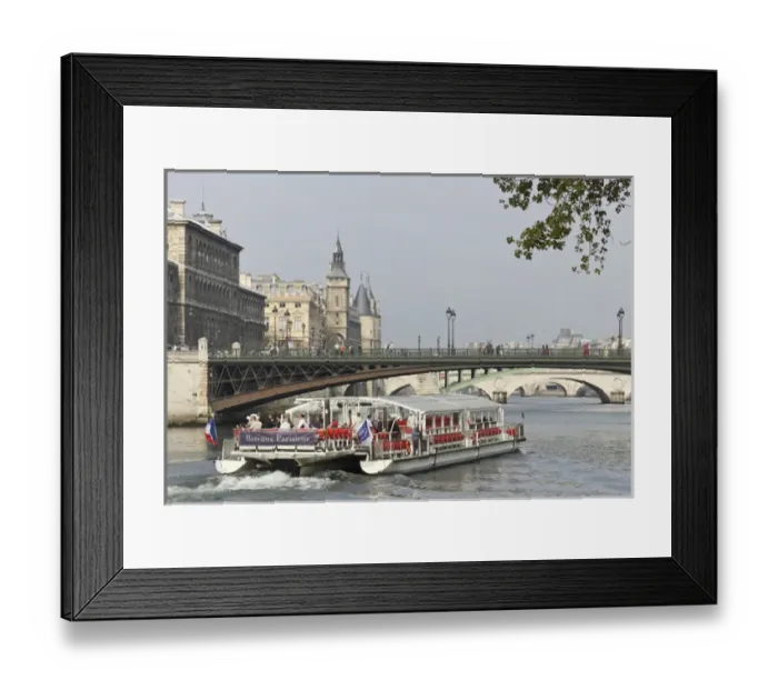 Framed Print : A bateaux cruises on the Seine river, Paris, France Framed Print : A bateaux cruises on the Seine river, Paris, France