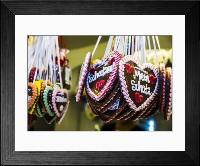 Framed Print : Augsburg, Germany. German Beer Festival frosted, hanging, gingerbread love hearts