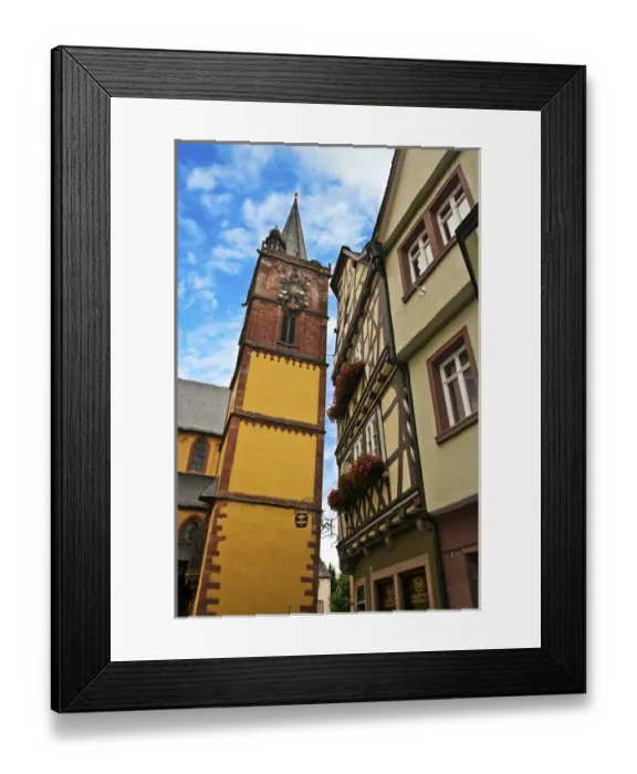 Framed Print : Wertheim, Franconia, Germany, A clock tower sits next to medieval Cross Timbered Houses
