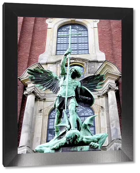 Sculpture of the archangel Michael defeating Satan, St Michaelis Church, Hamburg, Germany