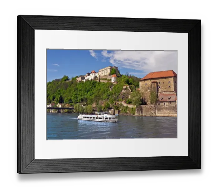 Framed Print : Passau, Germany, a tourist boat sails down the Danube River in front of Veste Oberhaus castle Framed Print : Passau, Germany, a tourist boat sails down the Danube River in front of Veste Oberhaus castle