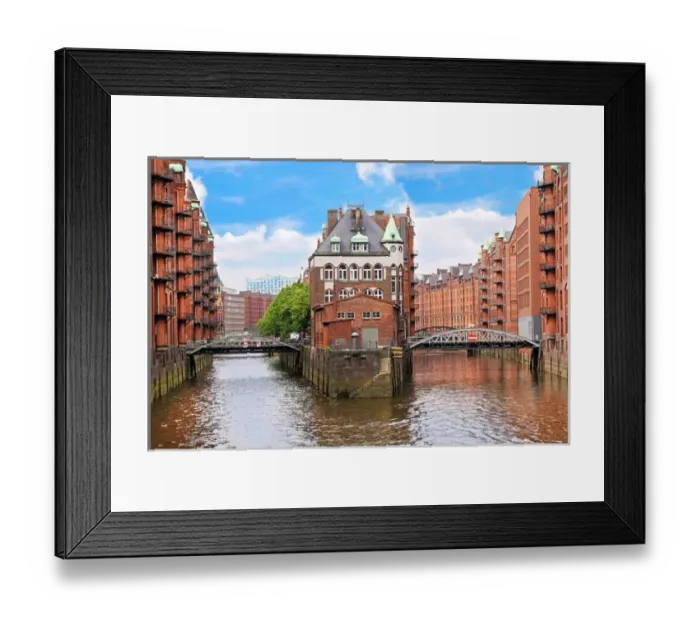 Framed Print : Waterfront warehouses in the Speicherstadt warehouse district of Hamburg, Germany Framed Print : Waterfront warehouses in the Speicherstadt warehouse district of Hamburg, Germany