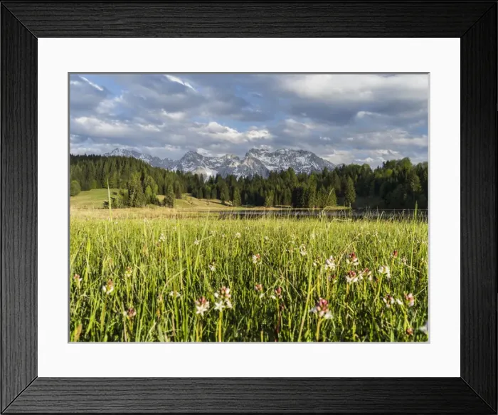 Framed Print : The Karwendel Mountain Range near Mittenwald during spring, lake Wagenbruch (also called Geroldsee)