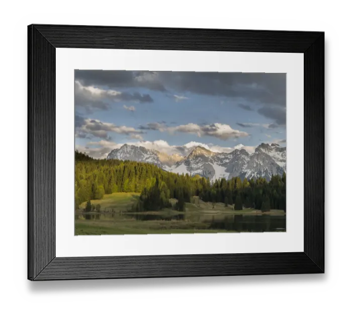 Framed Print : The Karwendel Mountain Range near Mittenwald during spring, lake Wagenbruch (also called Geroldsee)