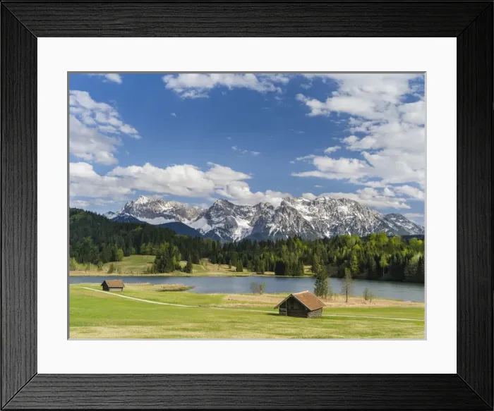 Framed Print : The Karwendel Mountain Range near Mittenwald during spring, lake Wagenbruch (also called Geroldsee)
