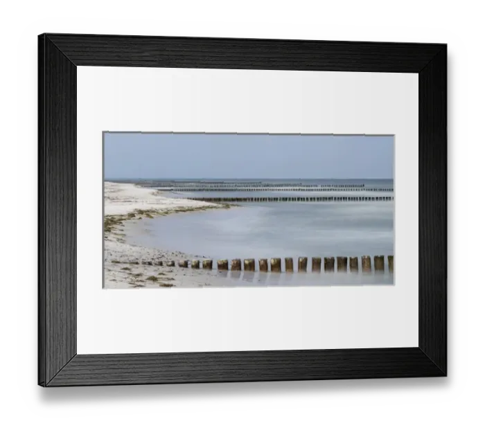 Framed Print : Groynes are protecting the coast outside the full protected Wilderness Area in