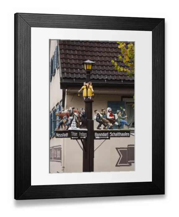 Framed Print : Germany, Baden-Wurttemburg, Black Forest, Lenzkirch, traditional carved wooden road signs Framed Print : Germany, Baden-Wurttemburg, Black Forest, Lenzkirch, traditional carved wooden road signs