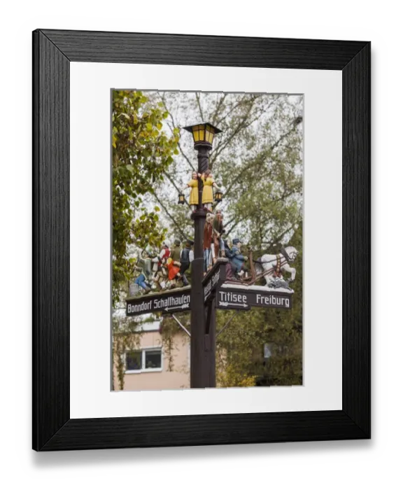 Framed Print : Germany, Baden-Wurttemburg, Black Forest, Lenzkirch, traditional carved wooden road signs