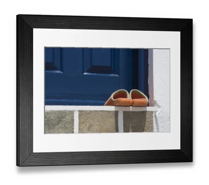 Framed Print : Europe, Greece, Mykonos, Hora. Orange slippers on threshold of blue door. Credit as