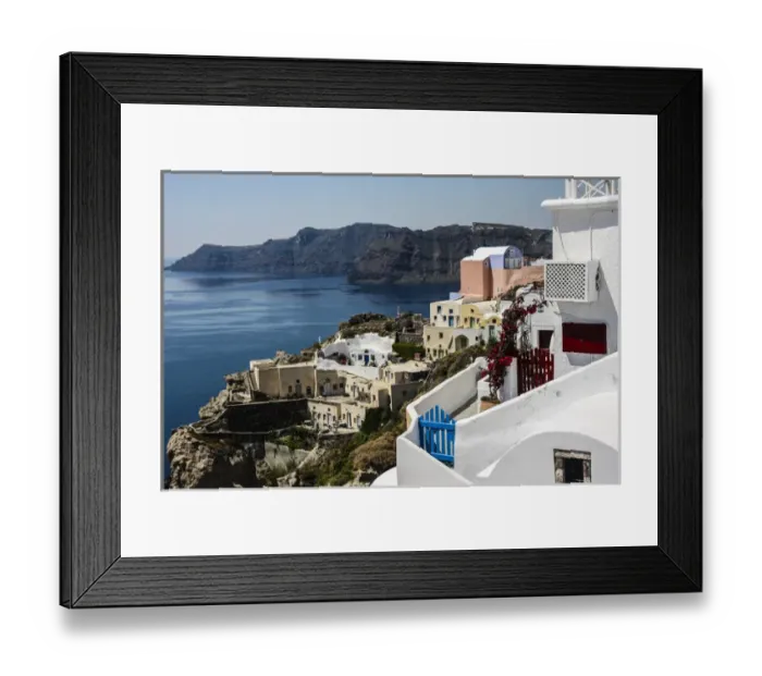 Framed Print : Oia, Santorini, Greece. Village of Oia with blue and red wooden gates and painted Framed Print : Oia, Santorini, Greece. Village of Oia with blue and red wooden gates and painted