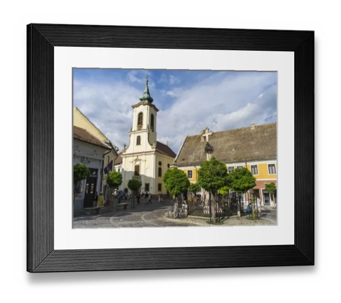 Framed Print : Szentendre near Budapest. Main Square (foe ter) with plague Column and the Blagovescenska church Framed Print : Szentendre near Budapest. Main Square (foe ter) with plague Column and the Blagovescenska church