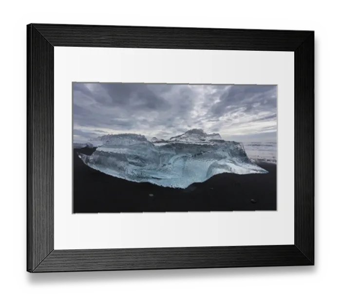Framed Print : Europe, Iceland. Iceberg piece from Jokulsarlon Lagoon washed onto black sand beach by storm
