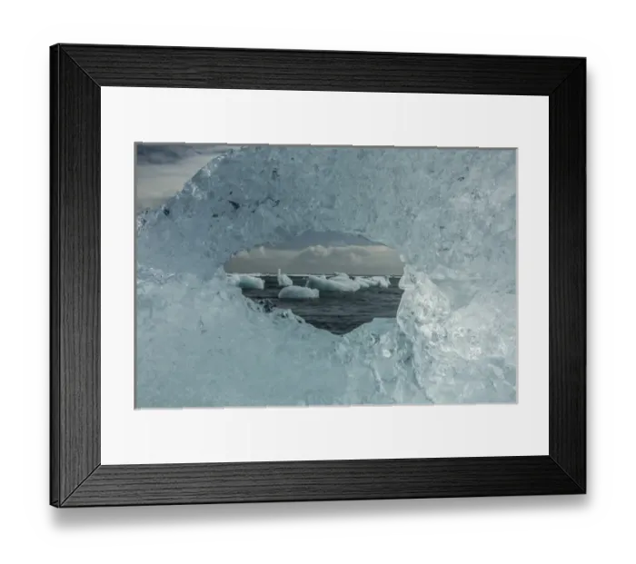 Framed Print : Europe, Iceland, Breidamerkursandur. Icebergs viewed through hole in ice. Credit as Framed Print : Europe, Iceland, Breidamerkursandur. Icebergs viewed through hole in ice. Credit as